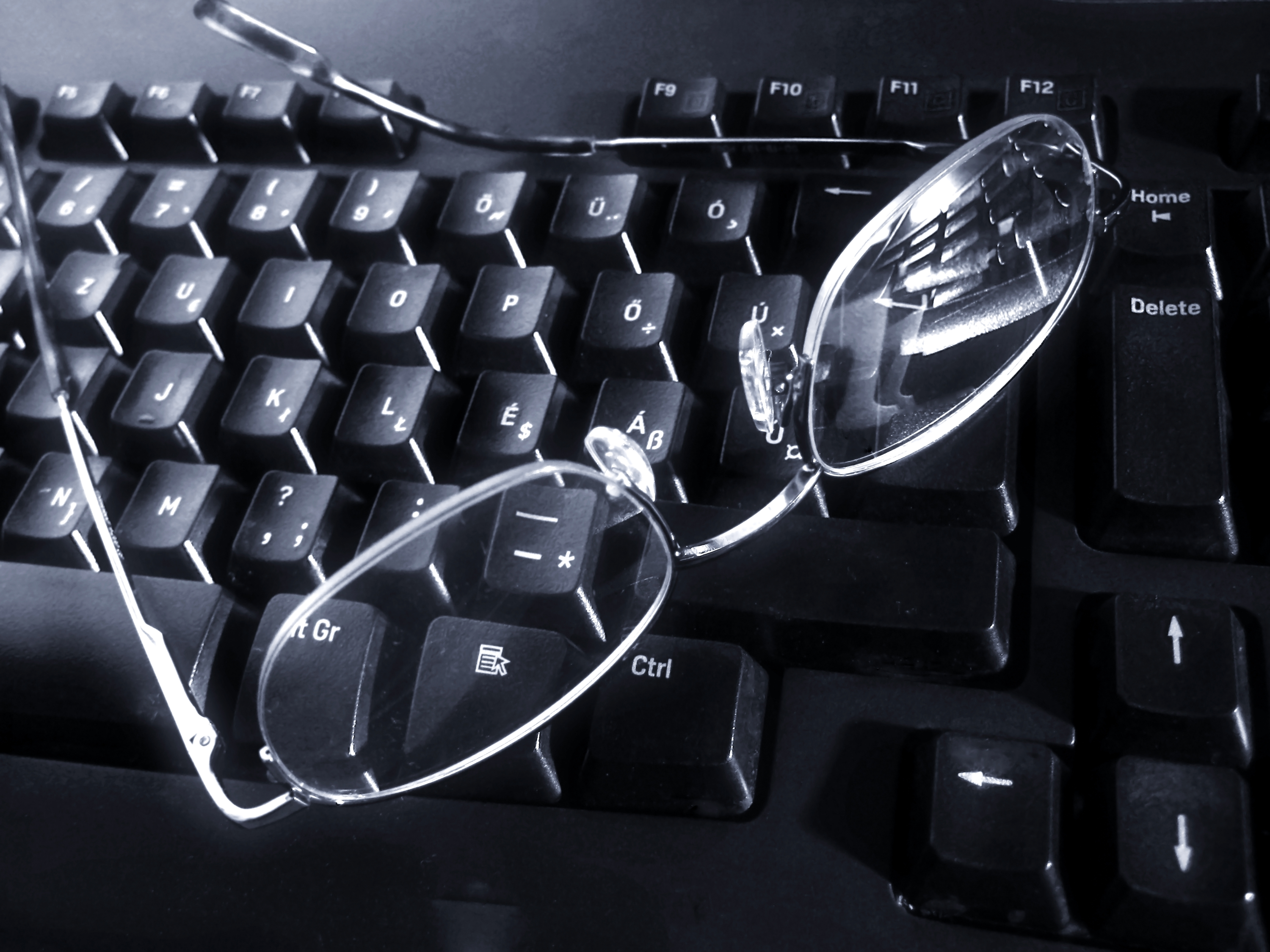 Glasses lying on the keyboard