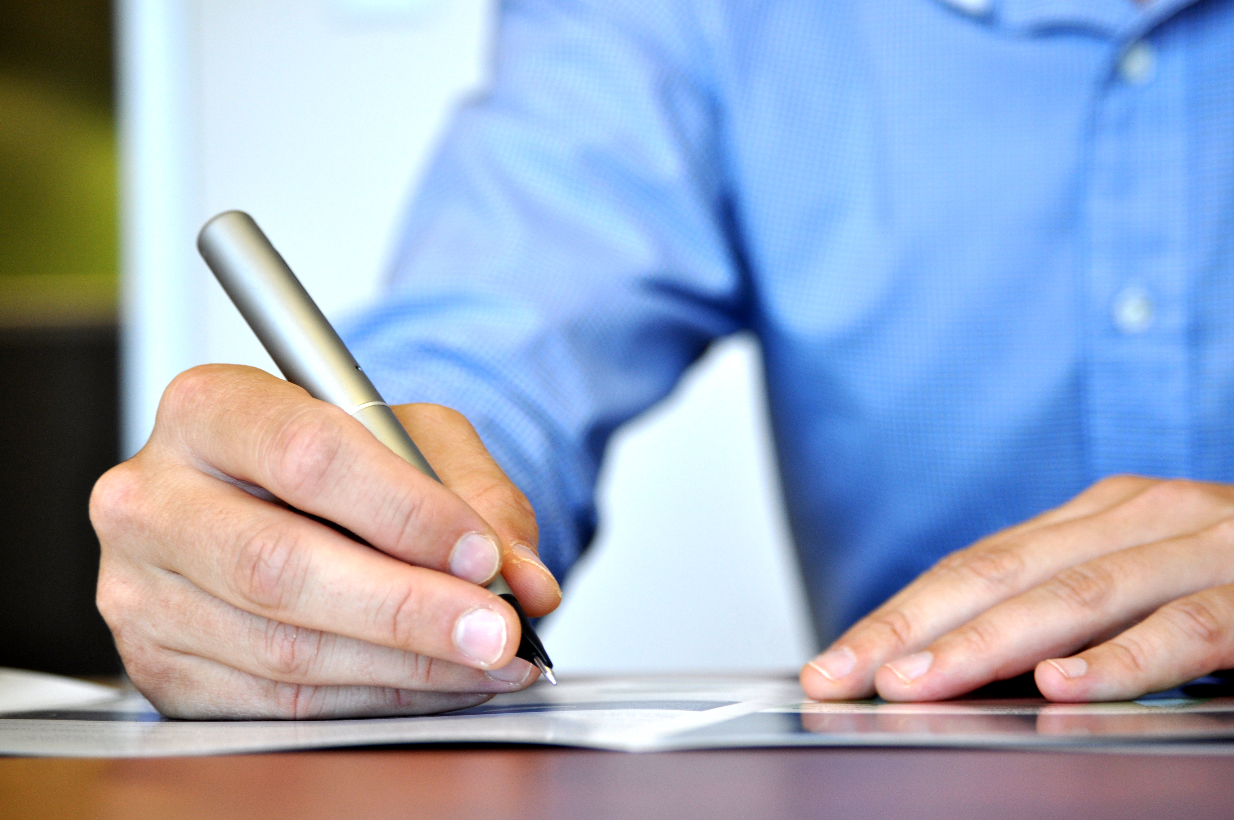 Man holding a pen