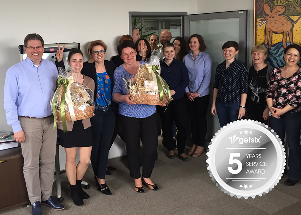 getsix® employees celebrating 5 years of service with gift baskets