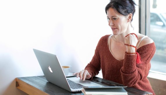 A woman using a laptop