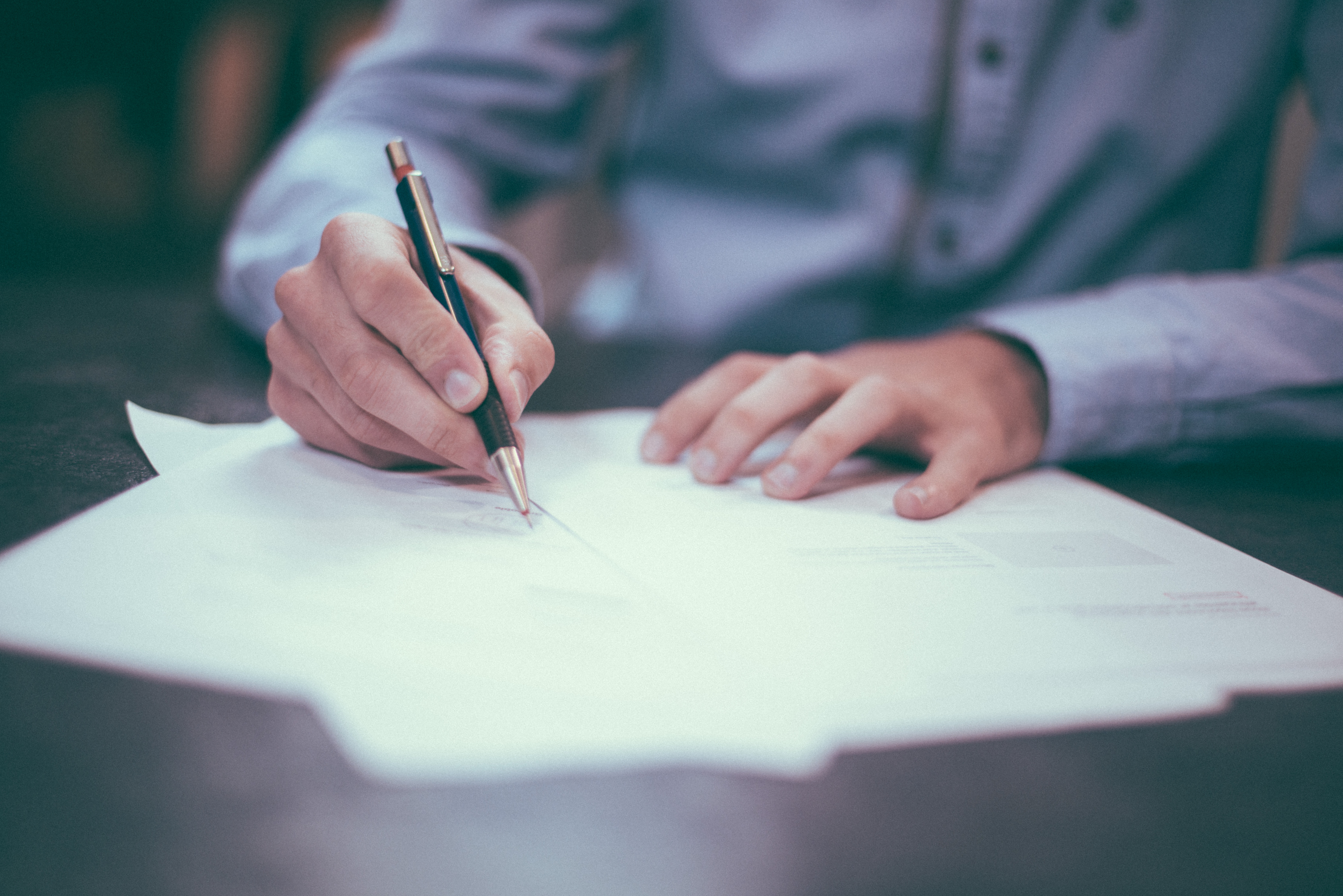 A man writing something