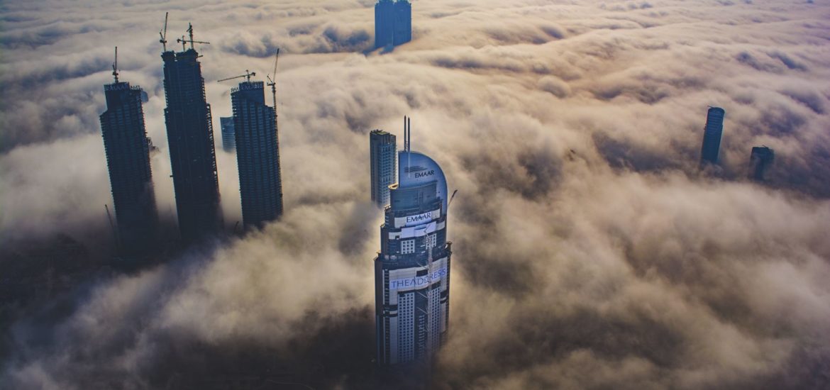 Buildings above the clouds