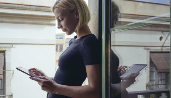 A woman looking at her phone